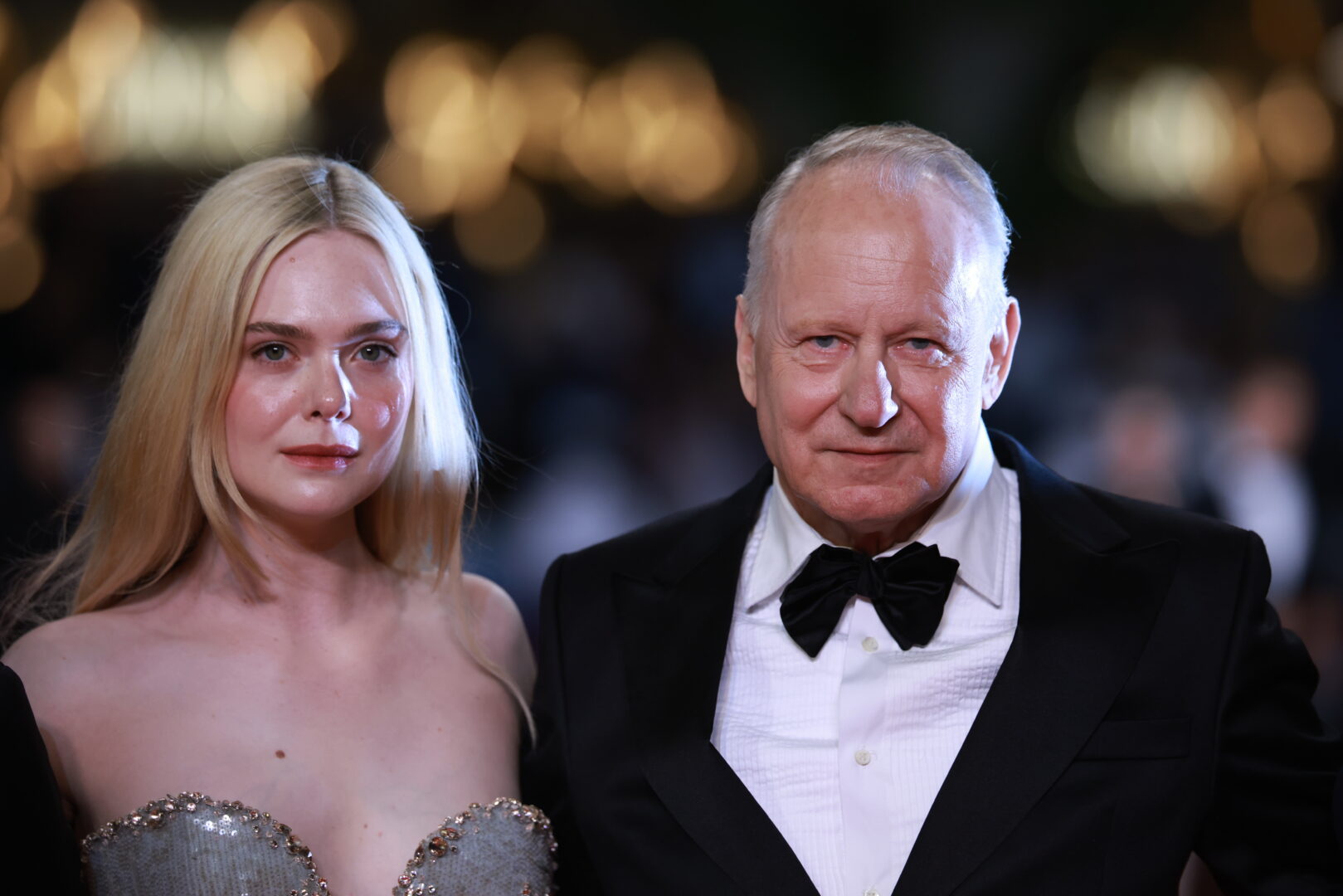 Elle Fanning (L) and Stellan Skarsgard attend the premiere of 'Affeksjonsverdi (Sentimental Value)' during the 78th annual Cannes Film Festival